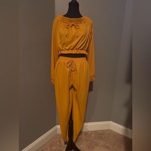 Yellow gold pants set with long sleeve off the shoulder  top shirt.